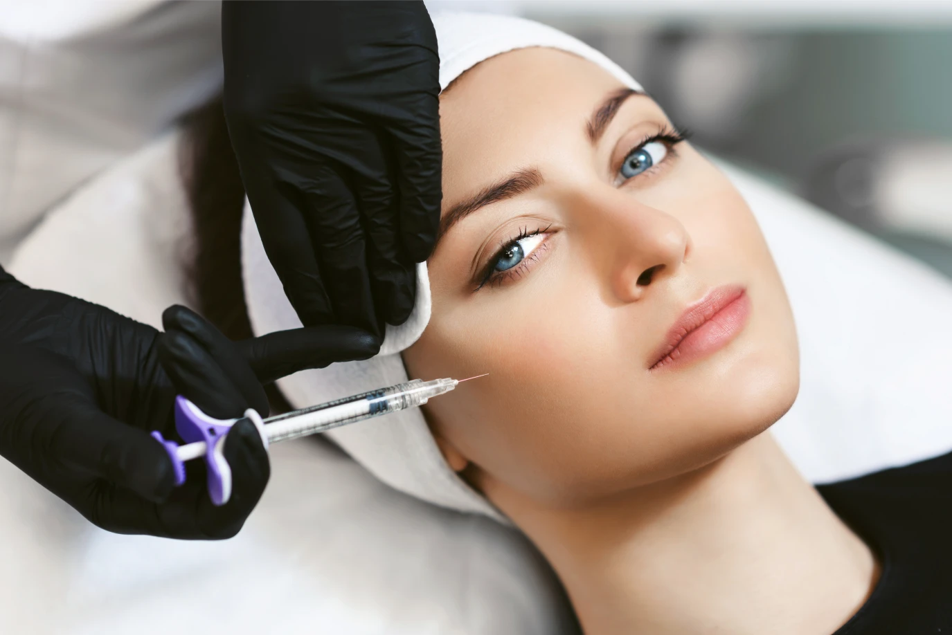 Patient receiving neurotoxin injection at Arabella Boutique Med Spa for wrinkle reduction and facial rejuvenation.